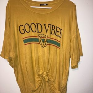 Good Vibes gold shirt
